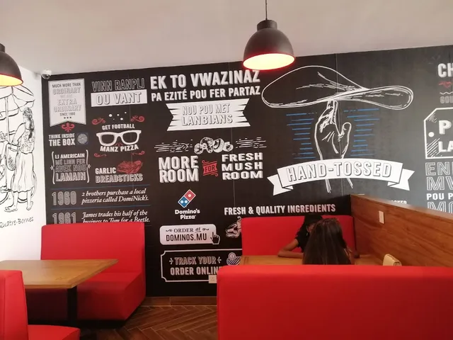 Original menu for Domino's Pizza Quatre Bornes, page 1